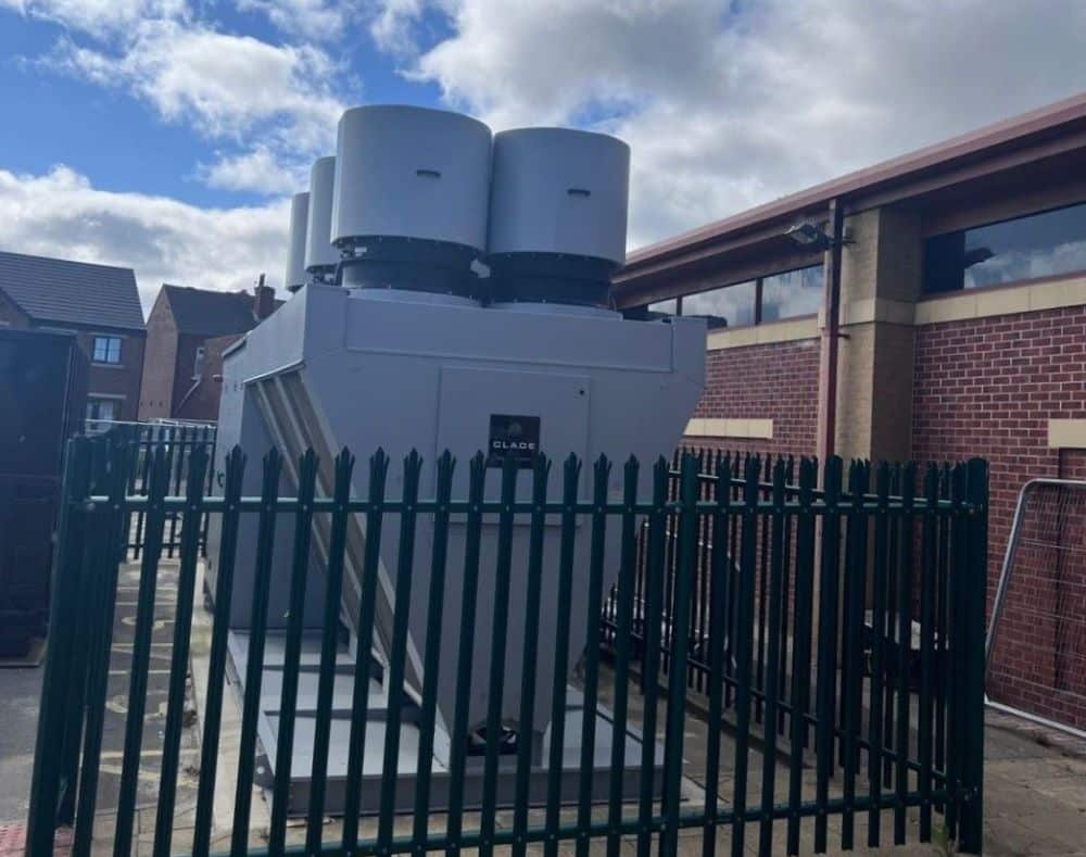 Heat pump with silencers